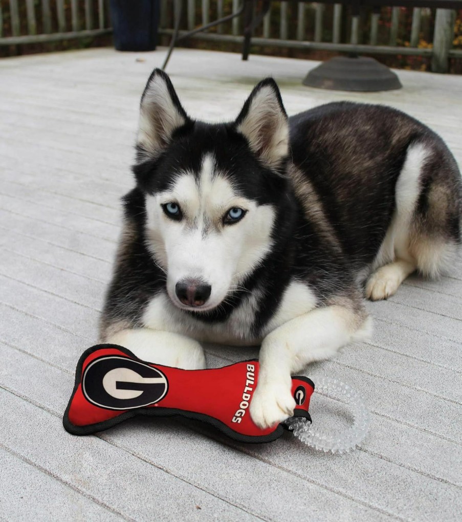 Small Animal Pets First | Pets First Ncaa Georgia Bulldogs College Dental Tough Dog Tug Bone Toy With Built-In Squeaker Attached To A Safe Rubber Teething Toothbrush Pet Toy, Team Color, 14 X 5 (Ga-3310)